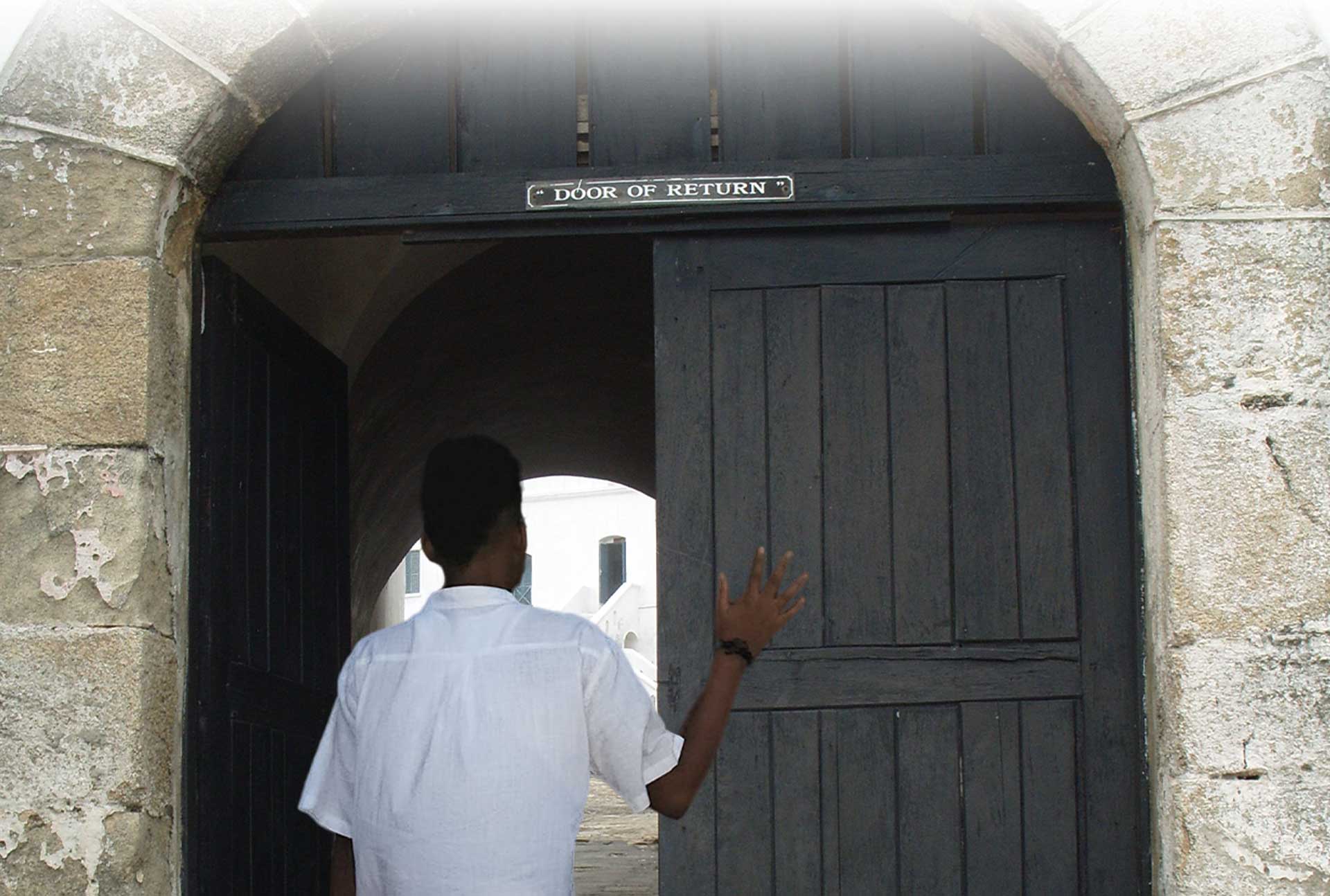 Stephon-at-Cape-Coast-Slave-Dungeon-Door-Of-No-Return-Ghana-Mobilee